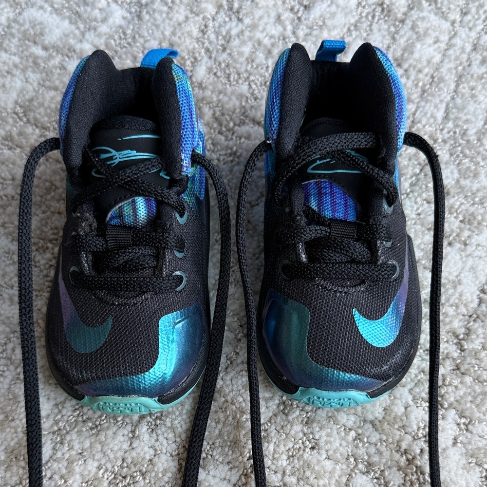 Nike Kids Black Shoes with Teal and Blue Iridescent Accents